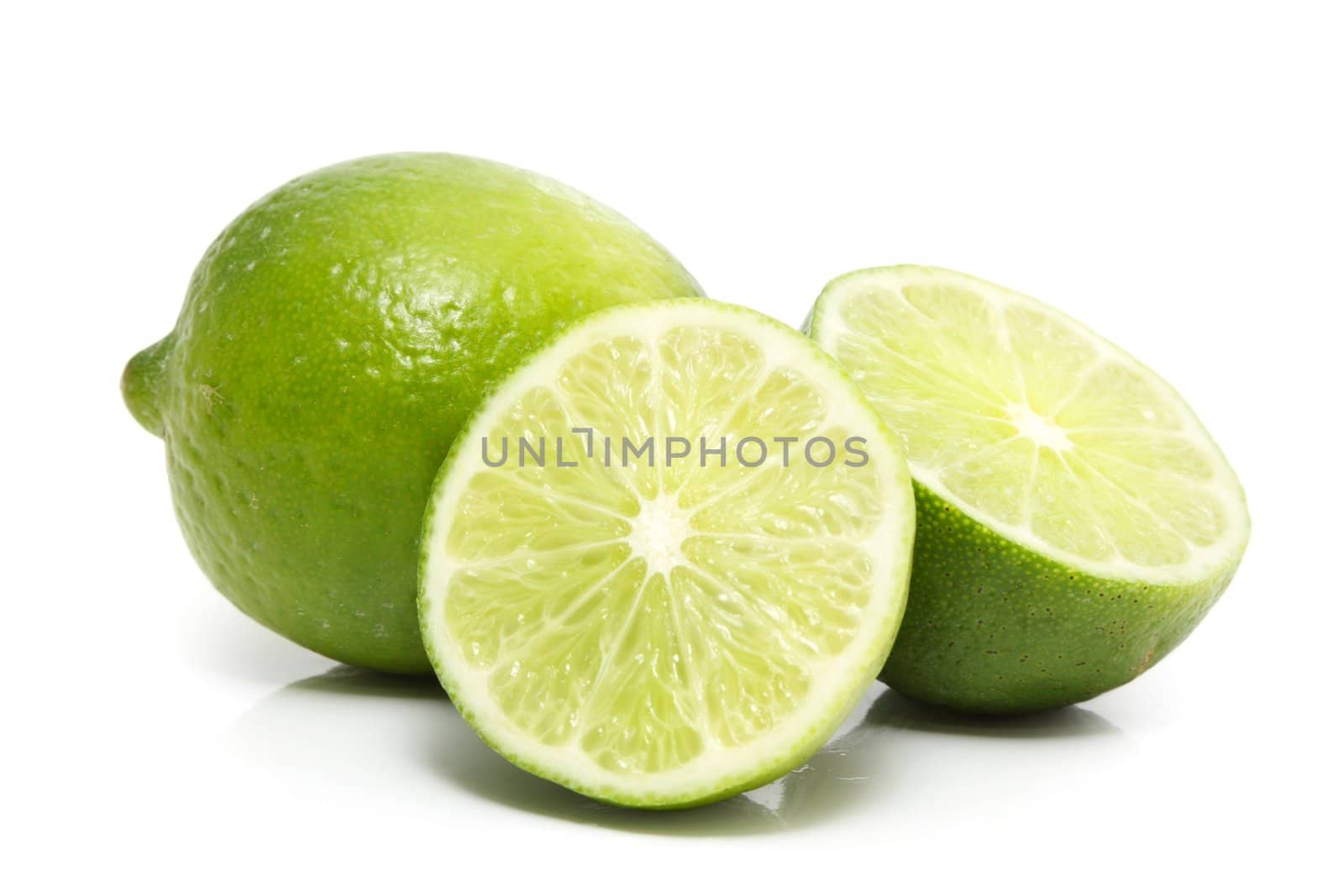 fresh lime on yellow background