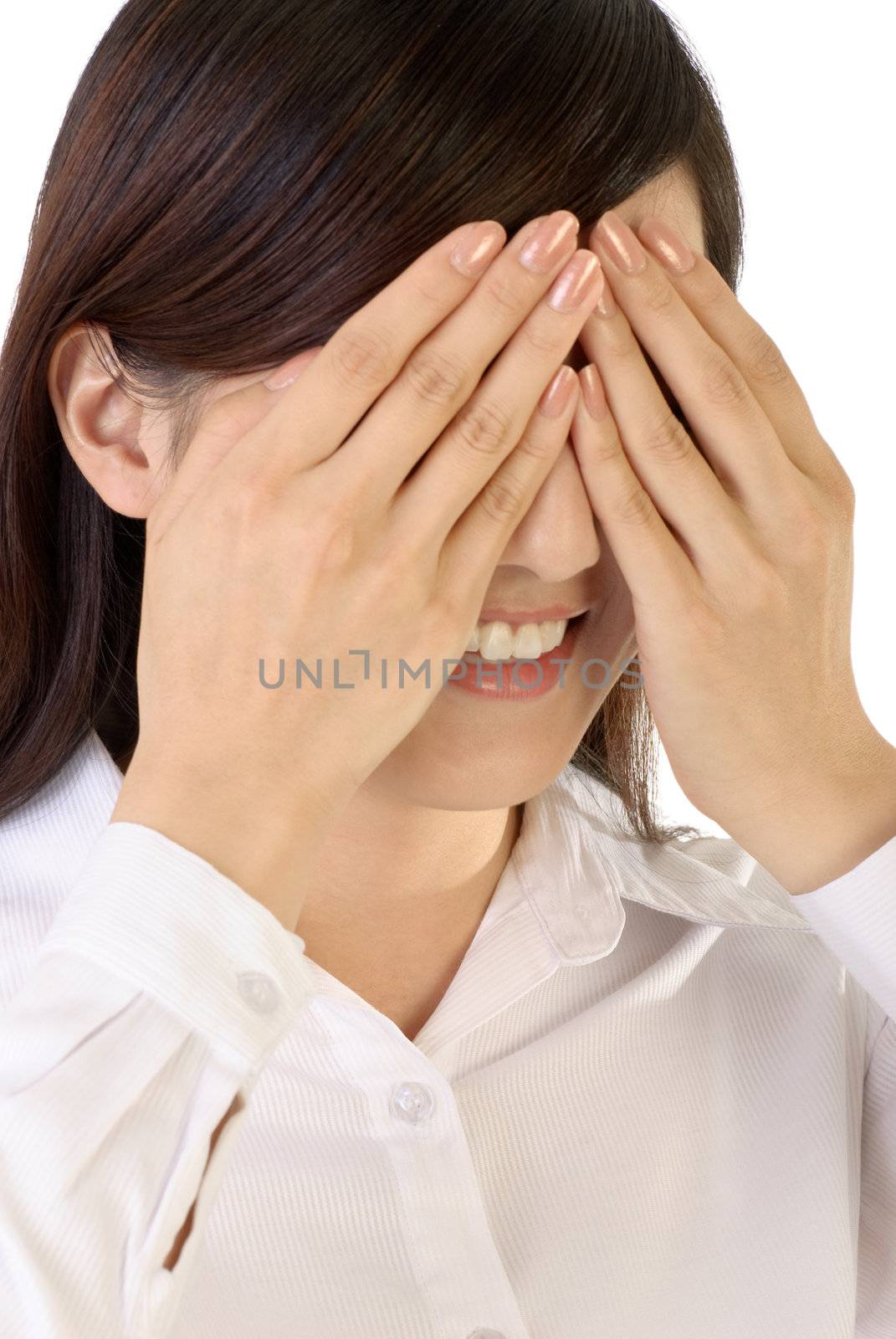 See no evil sign of Asian businesswoman hand on eyes on white background.