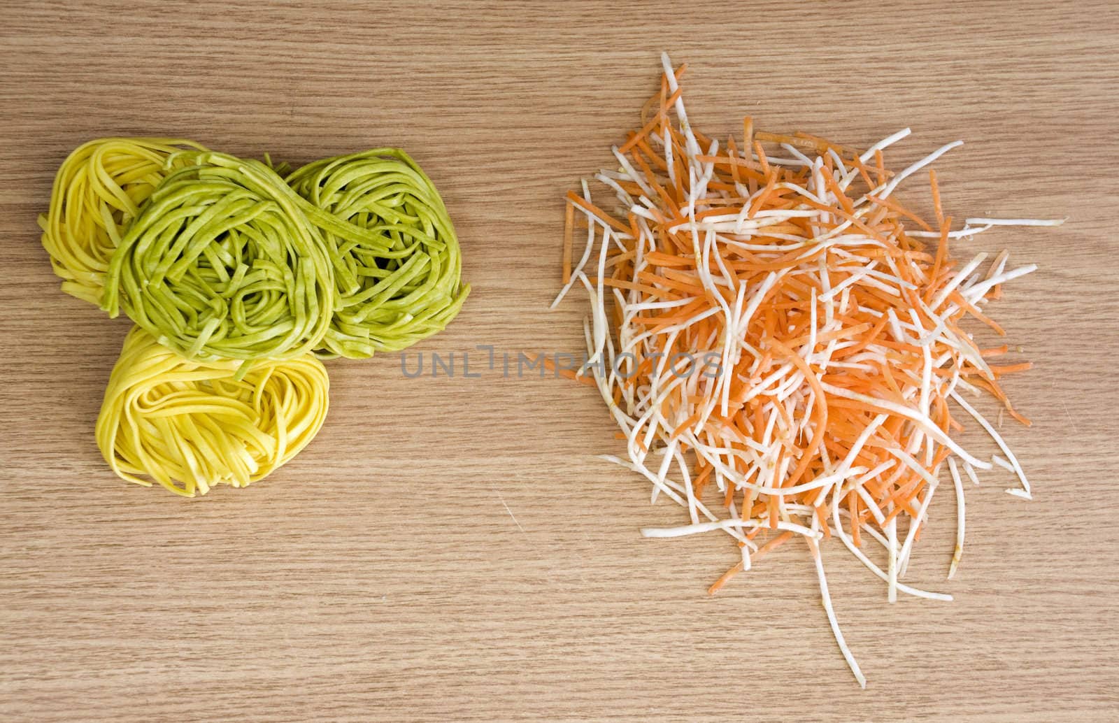 homemade pasta and freshly cut vegetables for salad