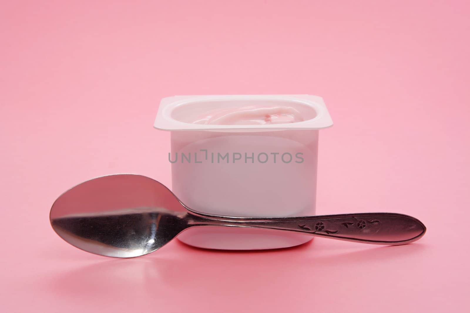 single portion of strawberry yogurt