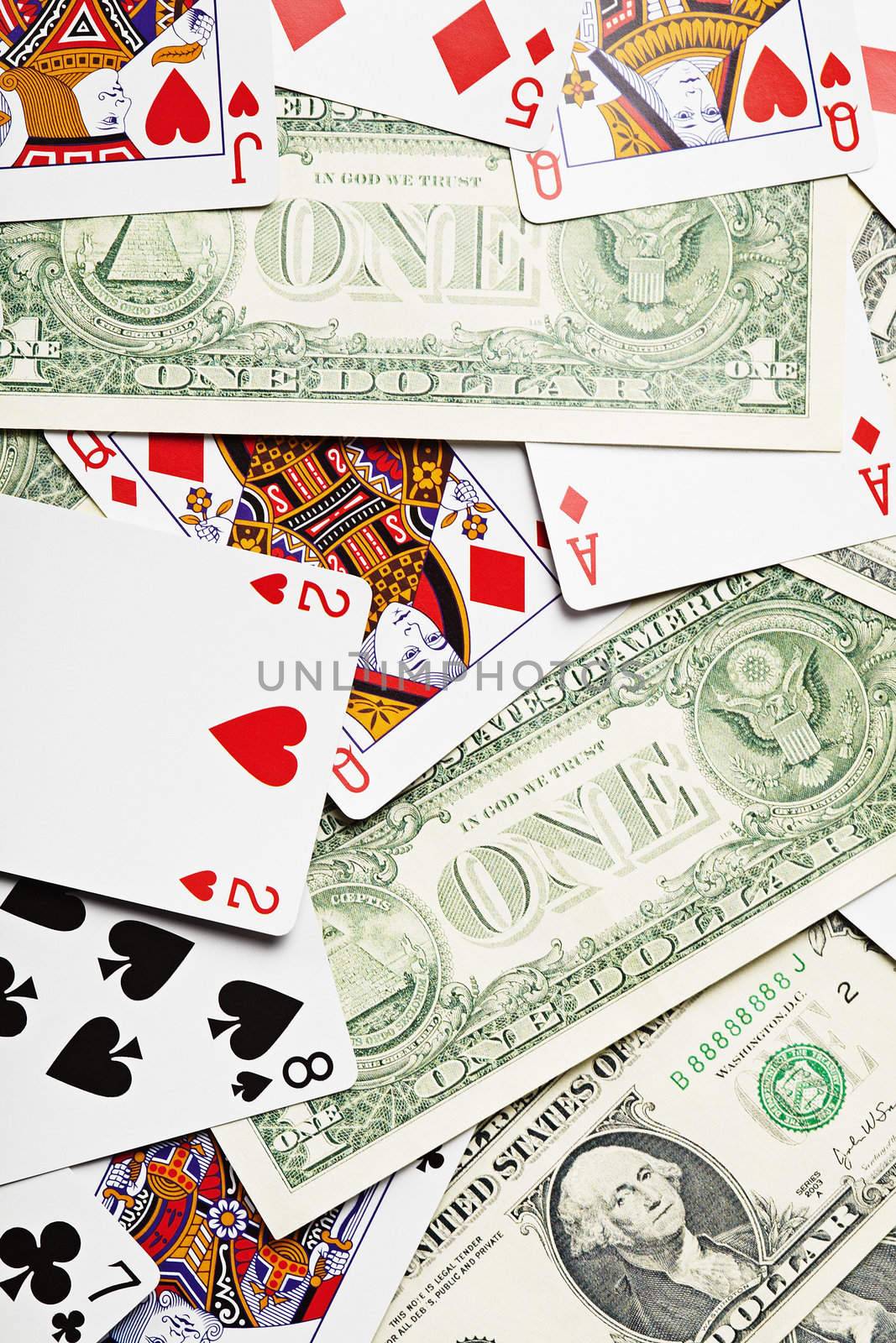 Background of playing cards and money - dollars