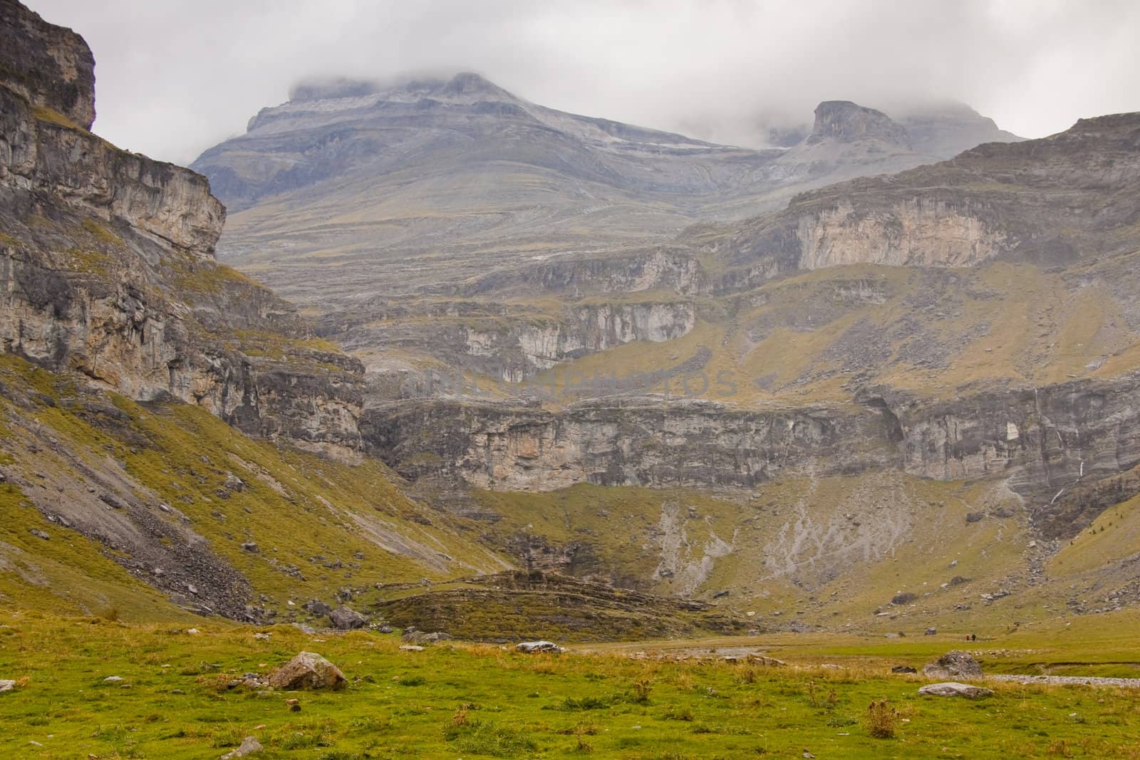 Ordesa valley - National spanish mountain park. Dark cloudy and rainy day. View to monte Perdido. Rainy day.