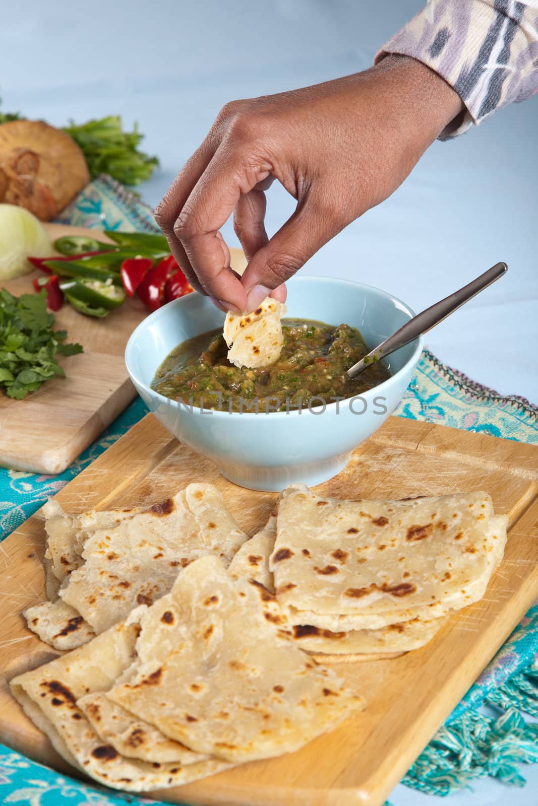 Typical indian style dip with roti bread and spicy tomato dip