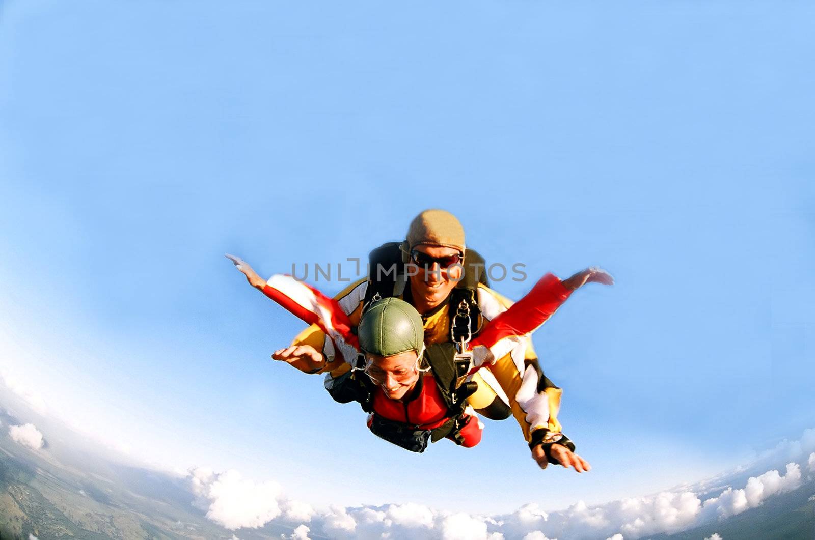 Portrait of two skydivers in action by speedfighter