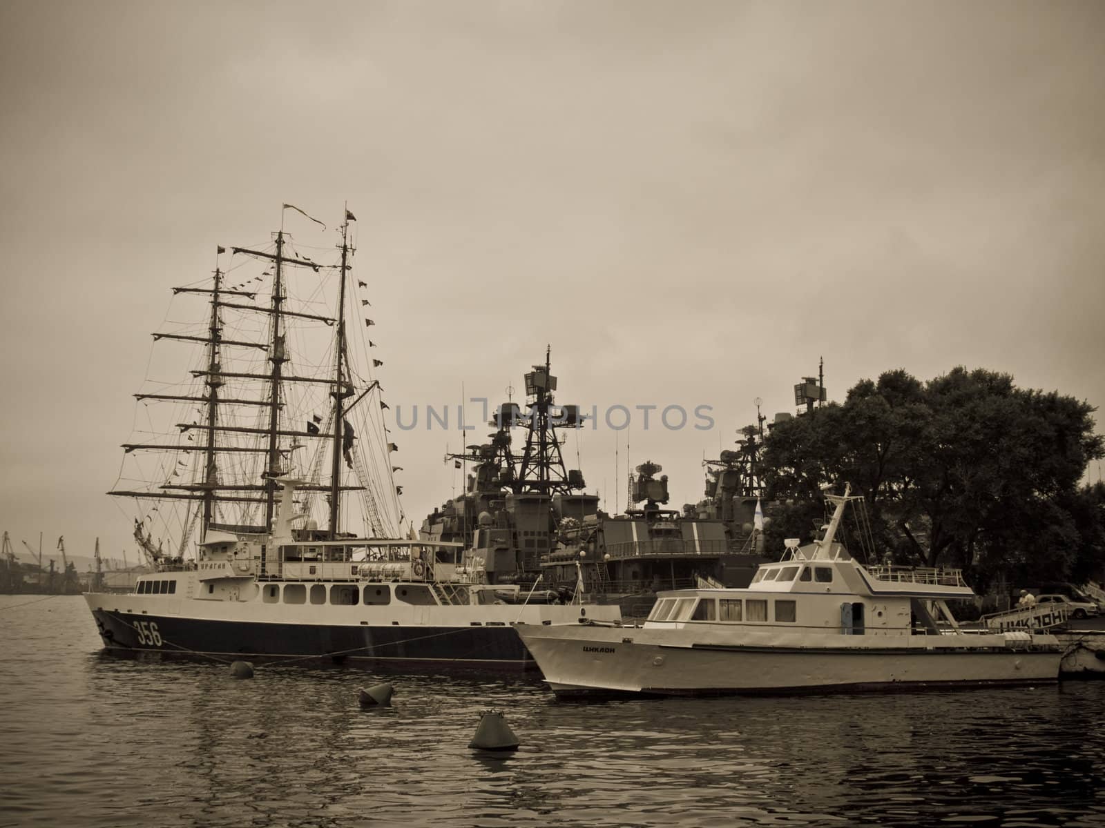 Sailing boat and warship by liseykina