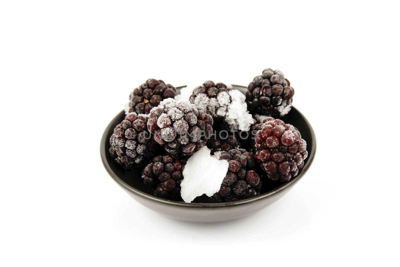 Frozen Blackberries in a Bowl by KeithWilson