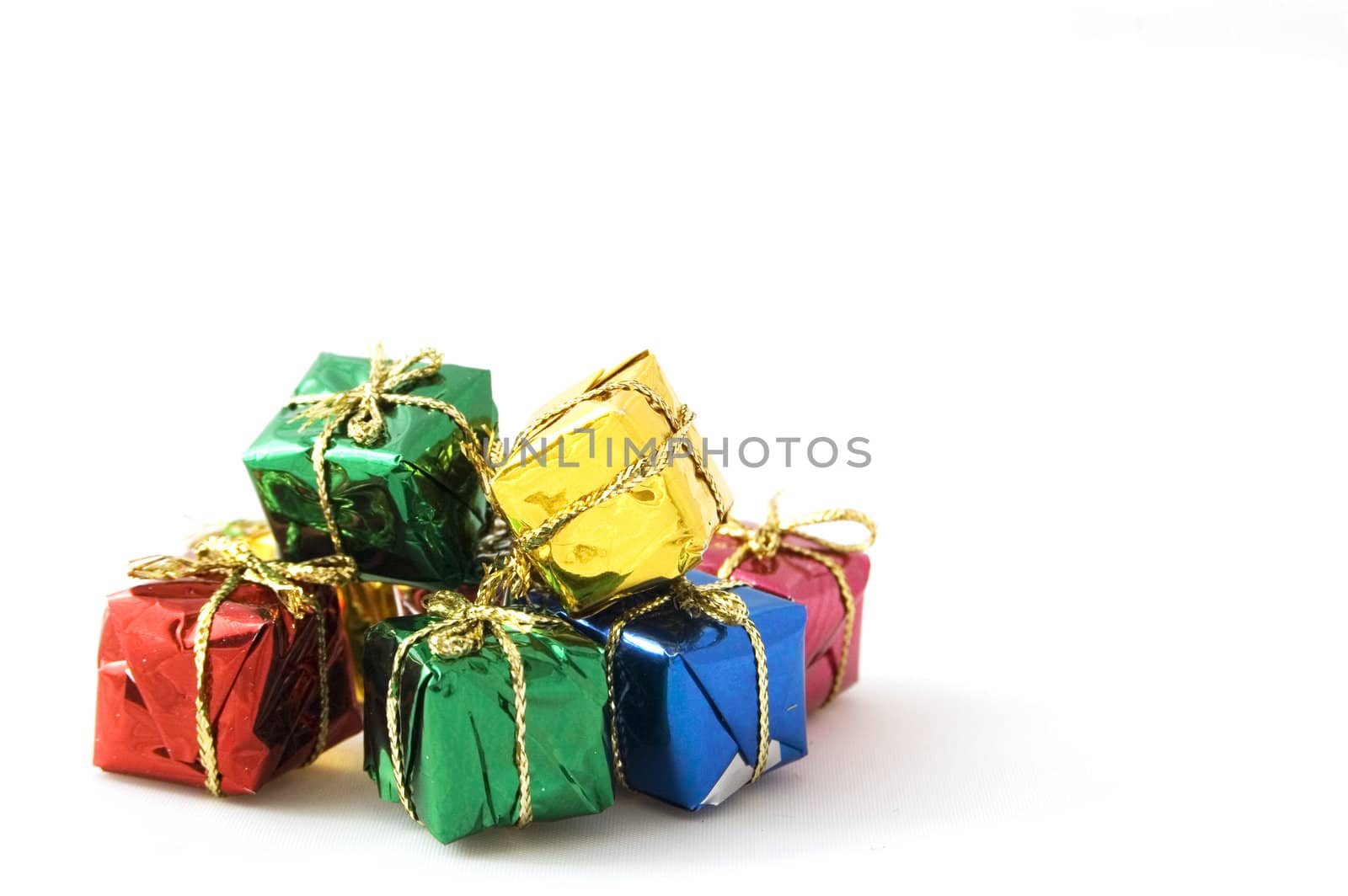 some christmas presents isolated on white background by ladyminnie