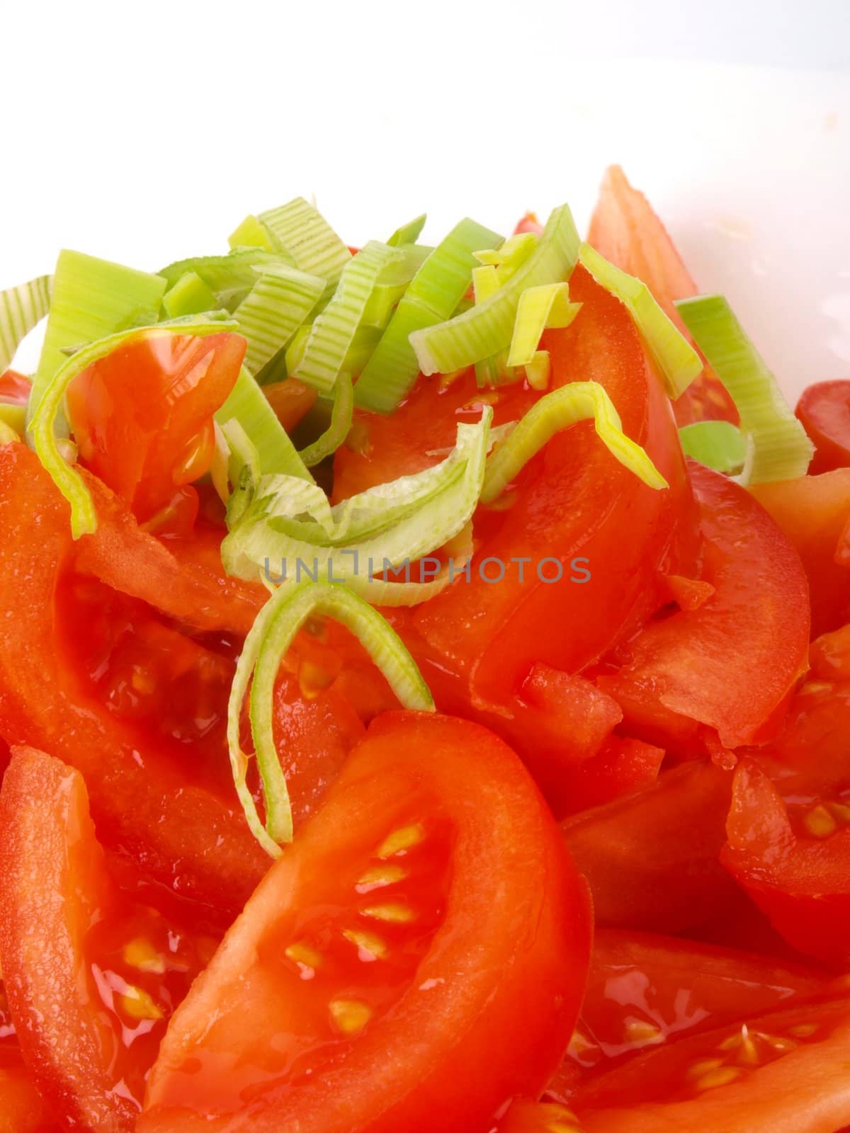 Fresh tomatoes and spring onions