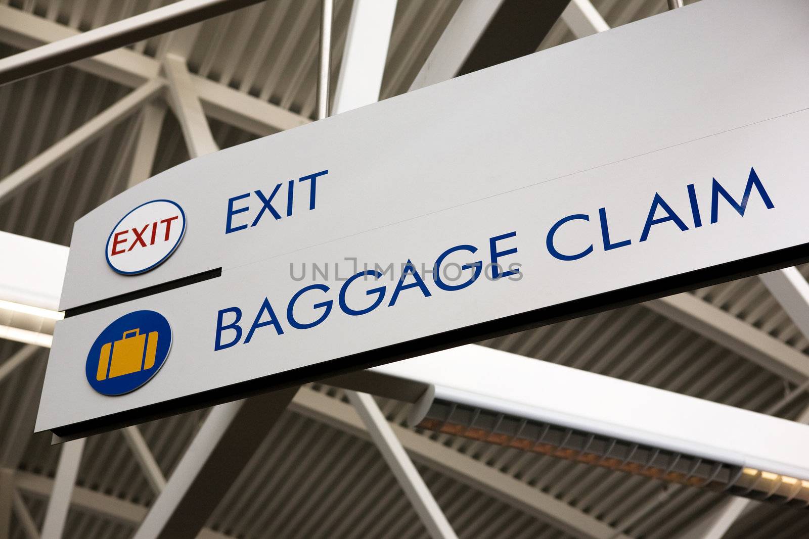 Baggage claim and exit sign in an airport