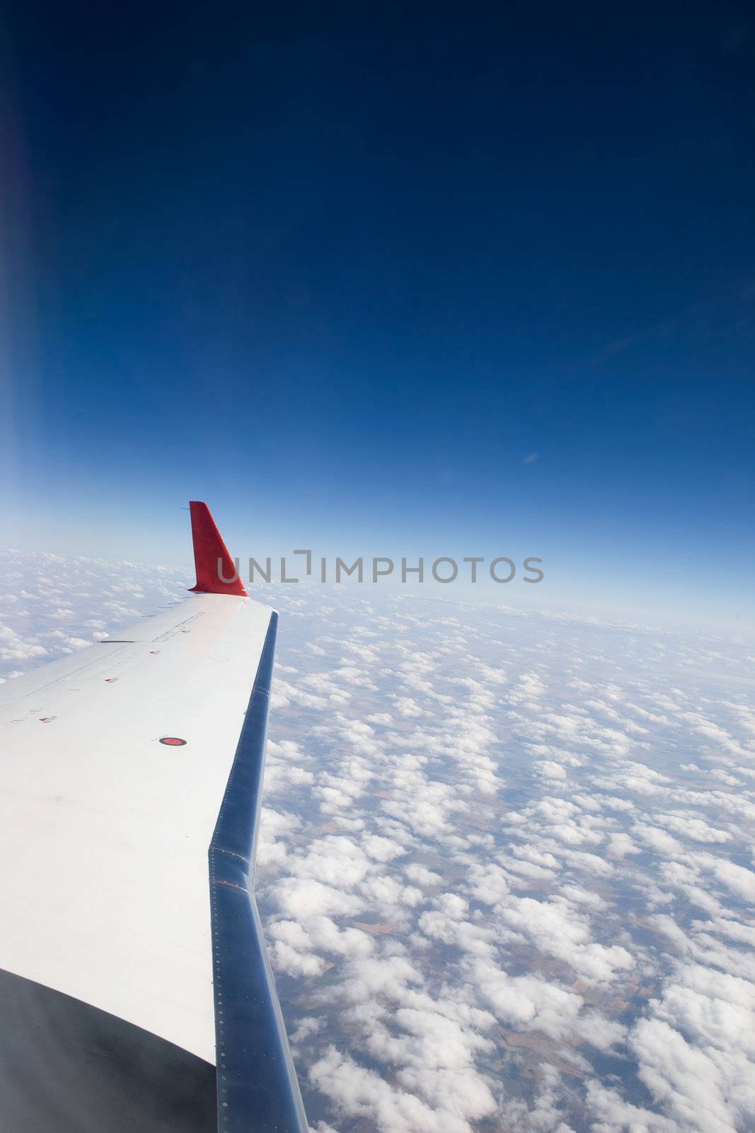 Wing detail on a plane in flight