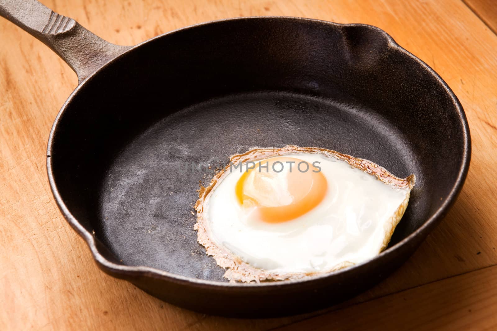 Egg in Frying Pan by leaf