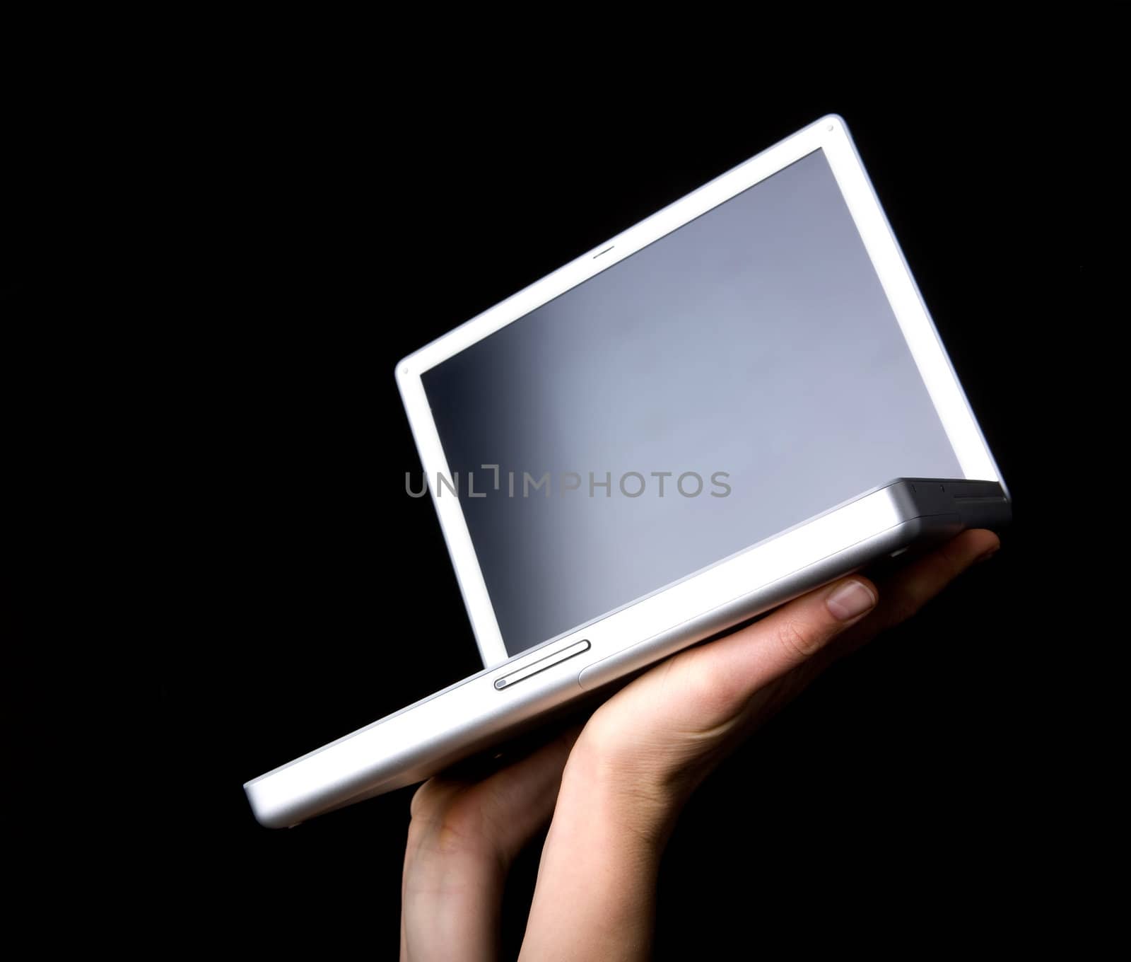 Laptop with blank screen - presented with a pair of hands