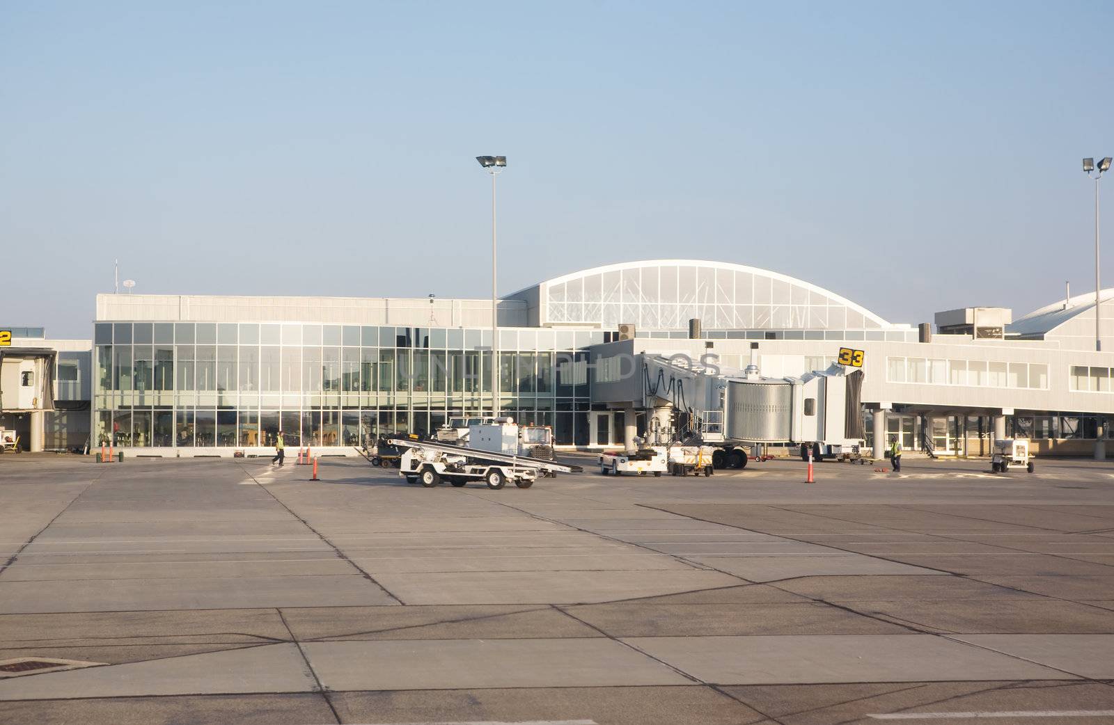 A empty small airplane terminal and tarmac