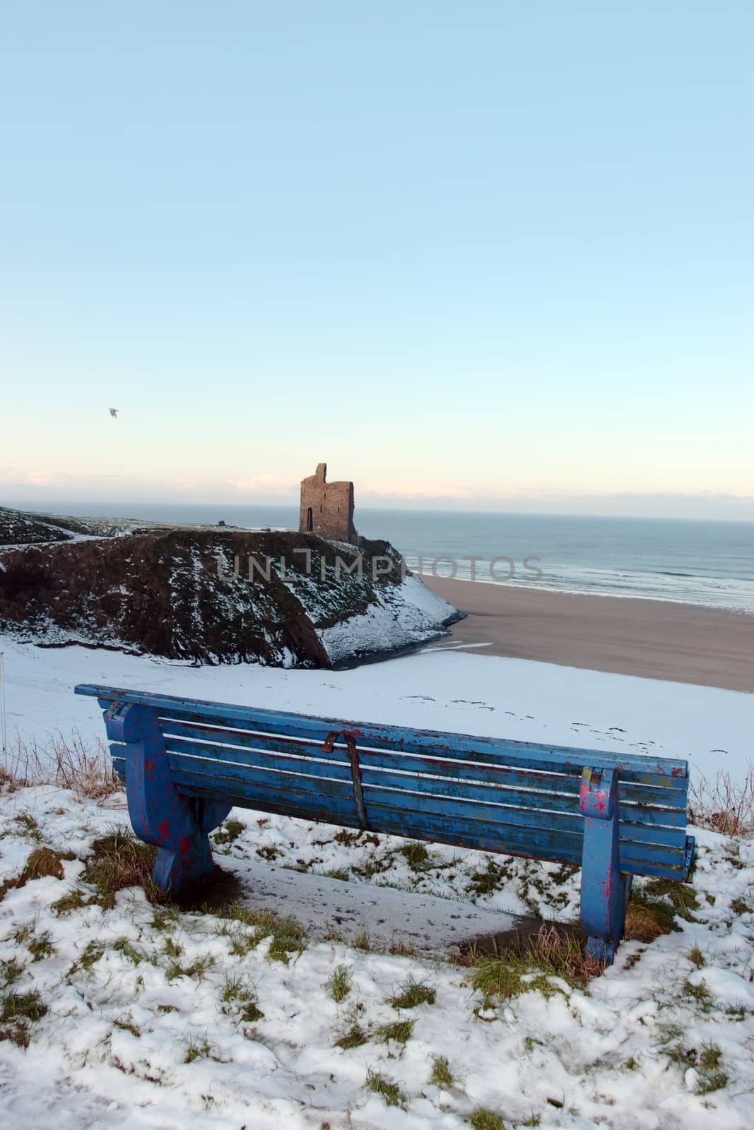 ballybunion bench in winter with view of castle beach and cliffs