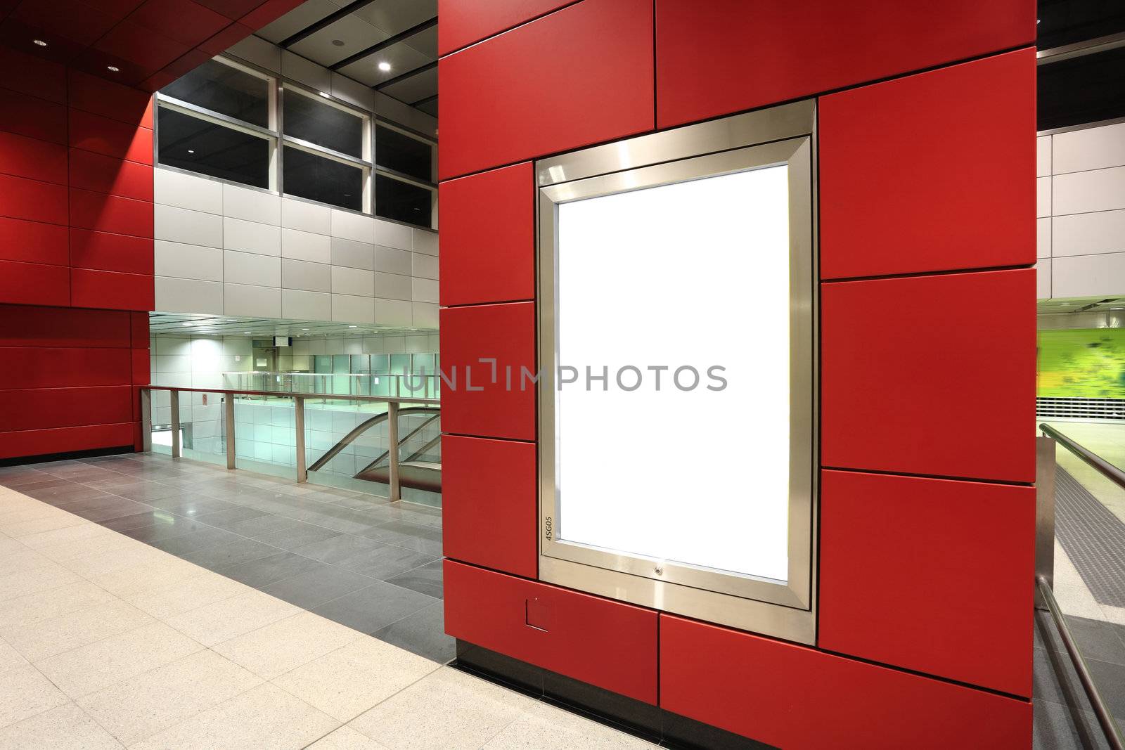 Blank billboard in metro station