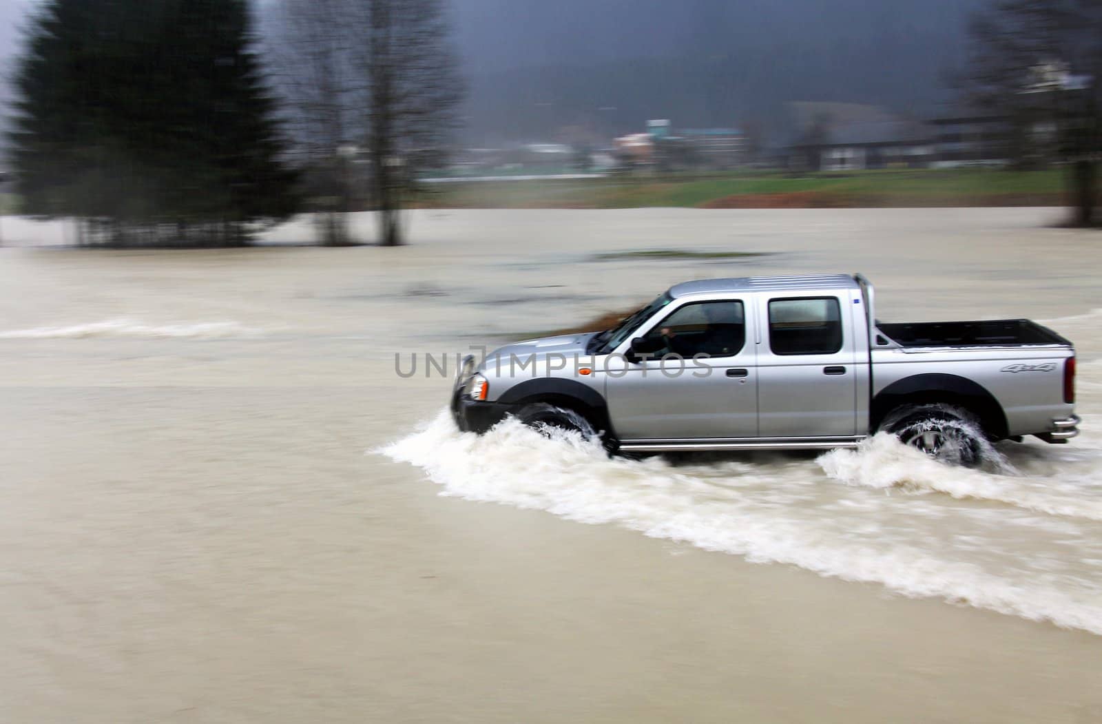 car on flooded road by Marko5
