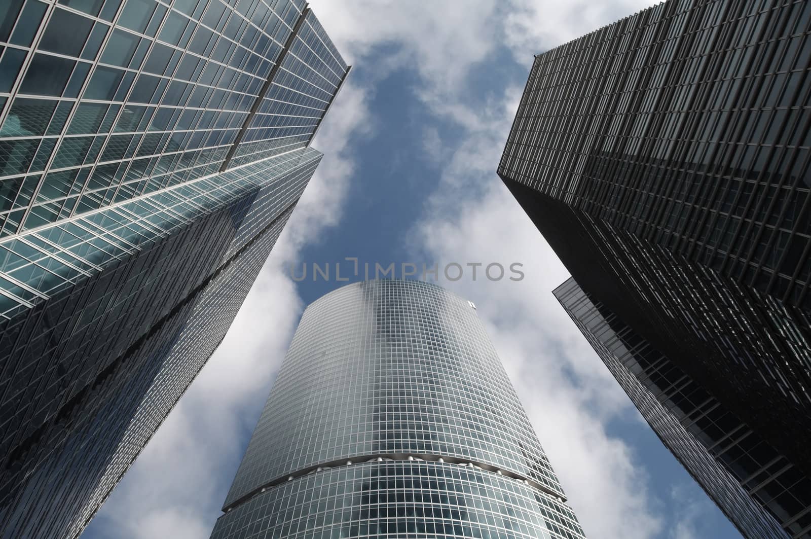 Skyscrapers and  blue sky with clouds