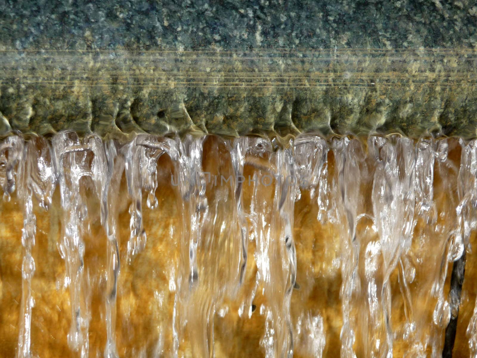 A abstract photograph of some falling water.