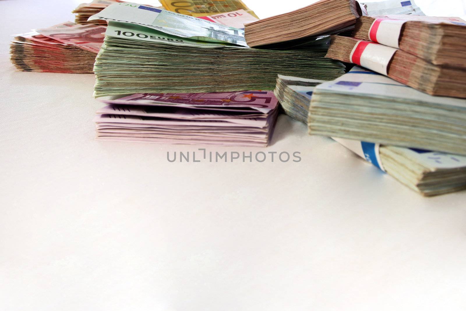 A large quantity of bank notes in the background  with copy space