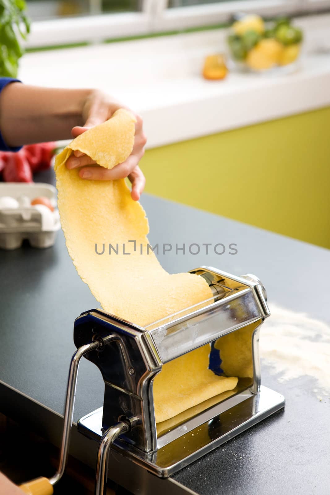 A detail - abstract image of a manual pasta machine