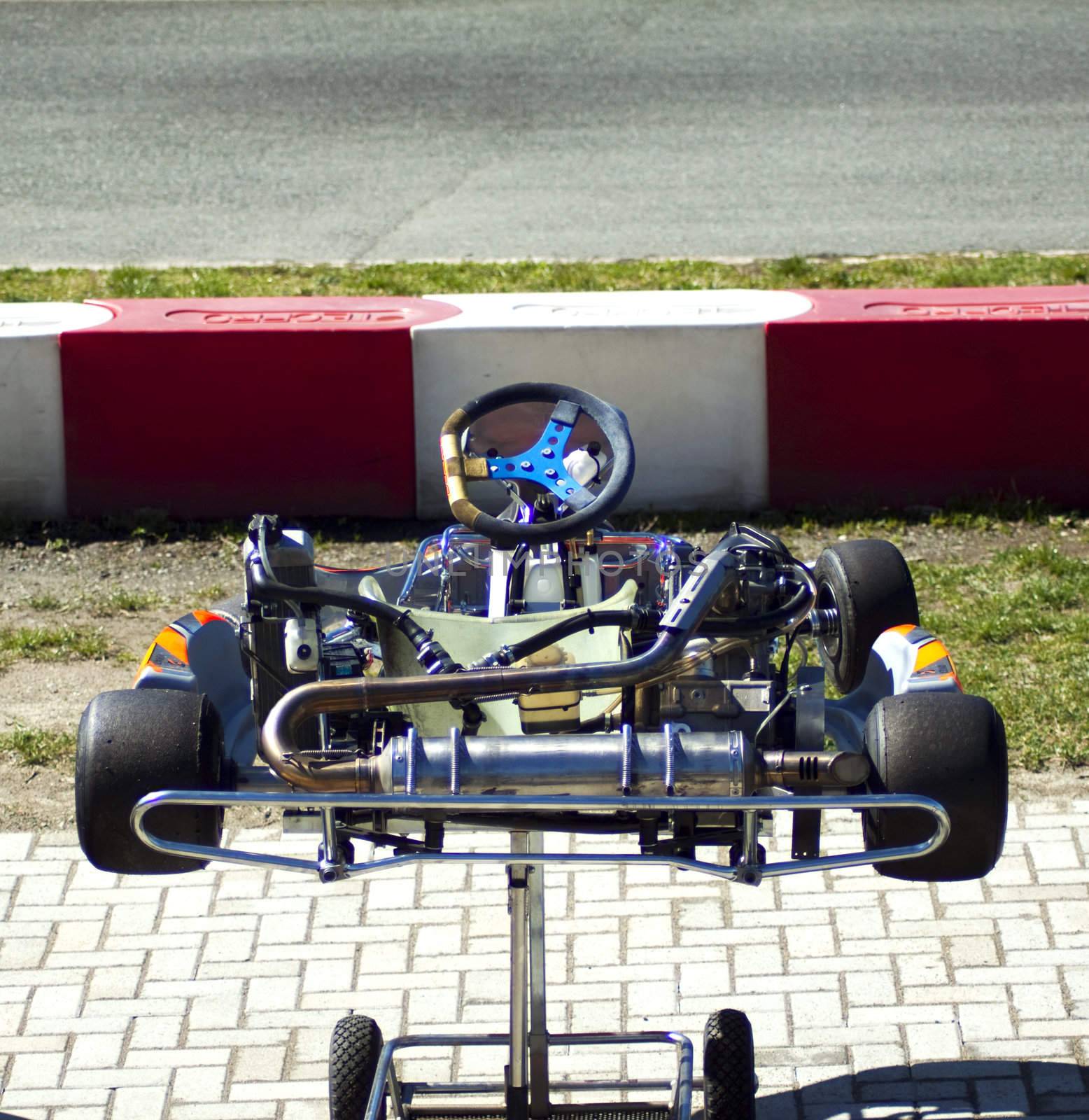 Still go-kart on a sustain, on the border of a track