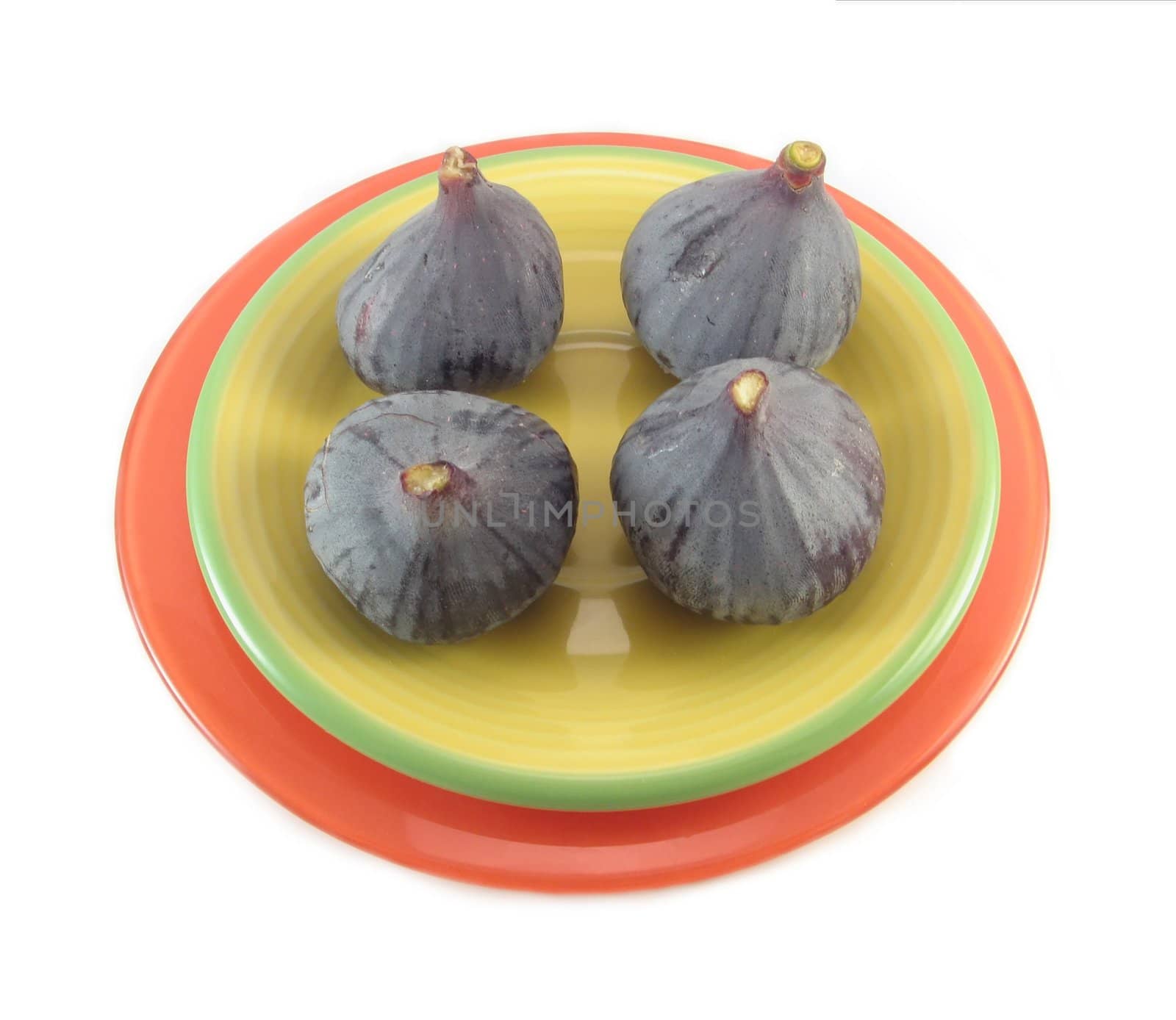 image of four figs on a plate