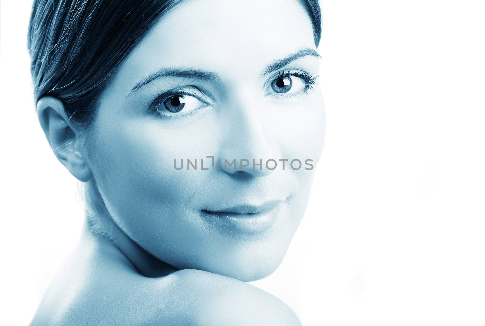 Close-up portrait of a beautiful and fresh woman isolated on white - toned in PS