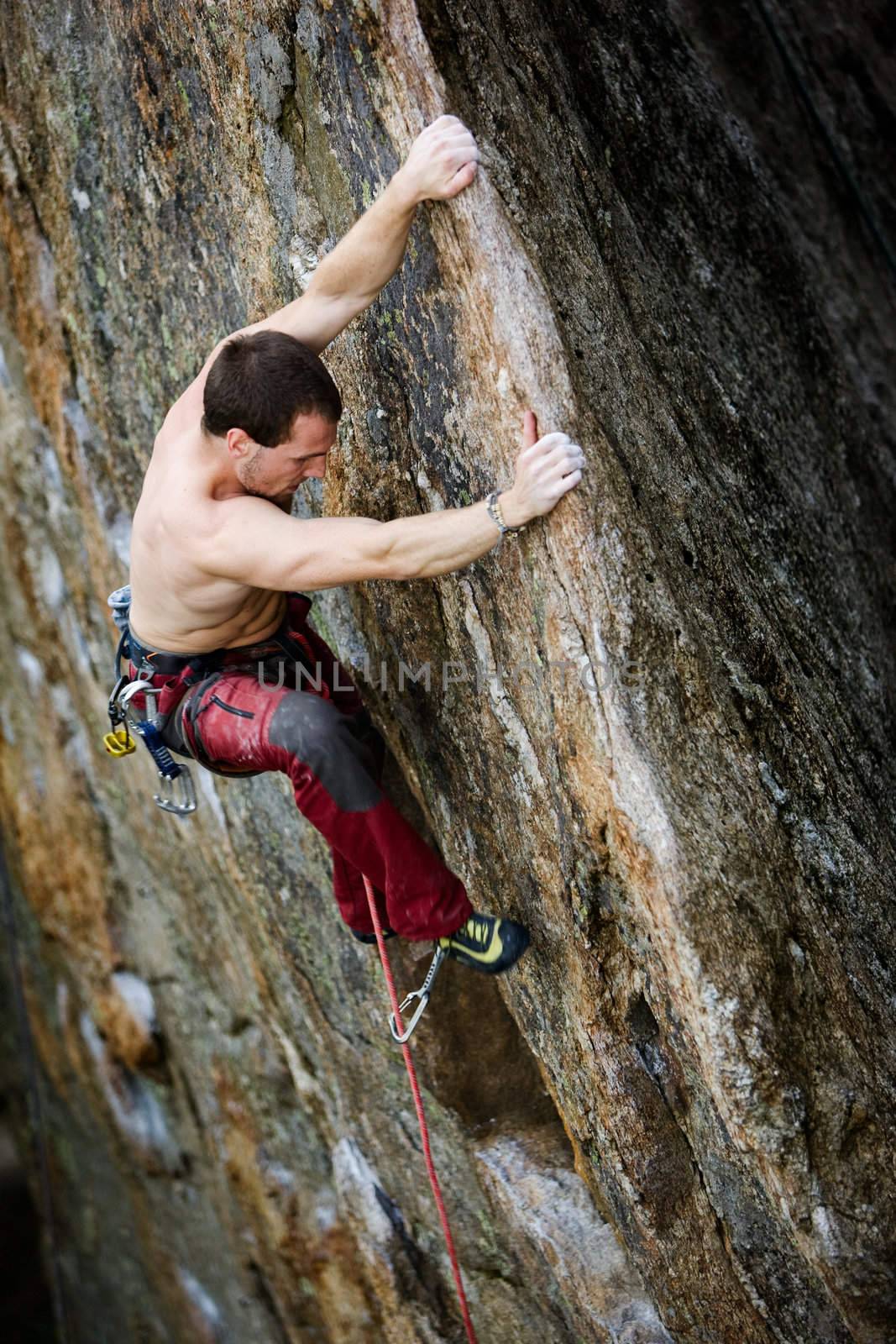A rock climber on a cliff