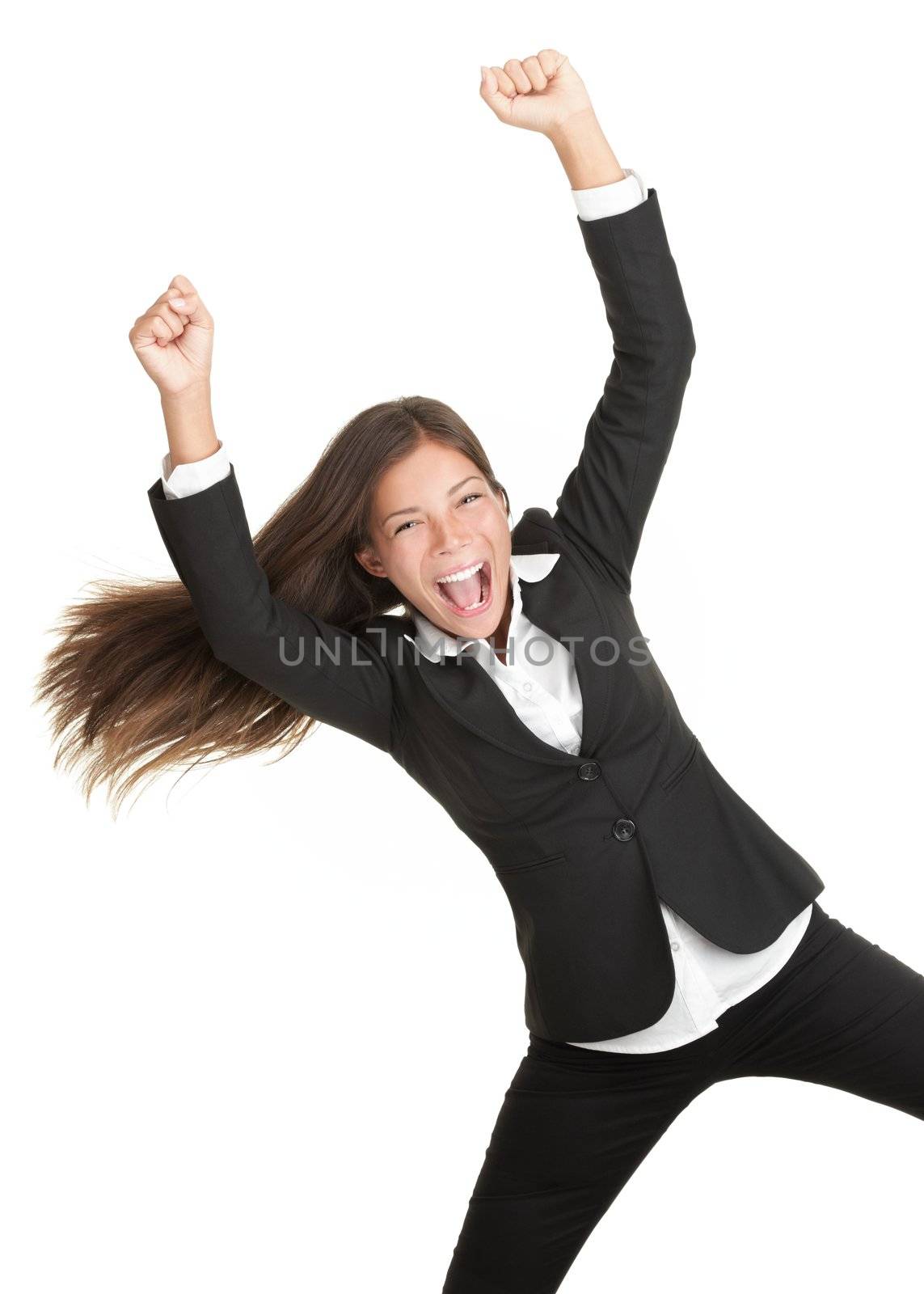 Cheerful celebrating success woman isolated. Young successful and very happy multiracial businesswoman with her arm in the air. Isolated on white background. 