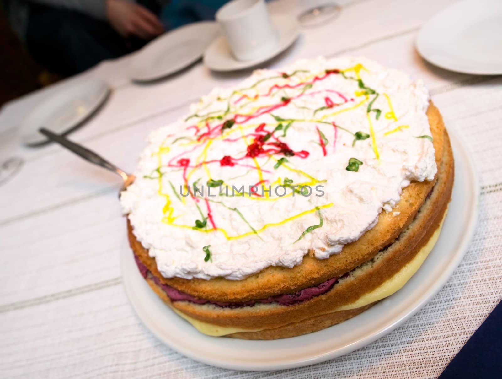 A close up of a cream cake taken with a shallow depth of field.