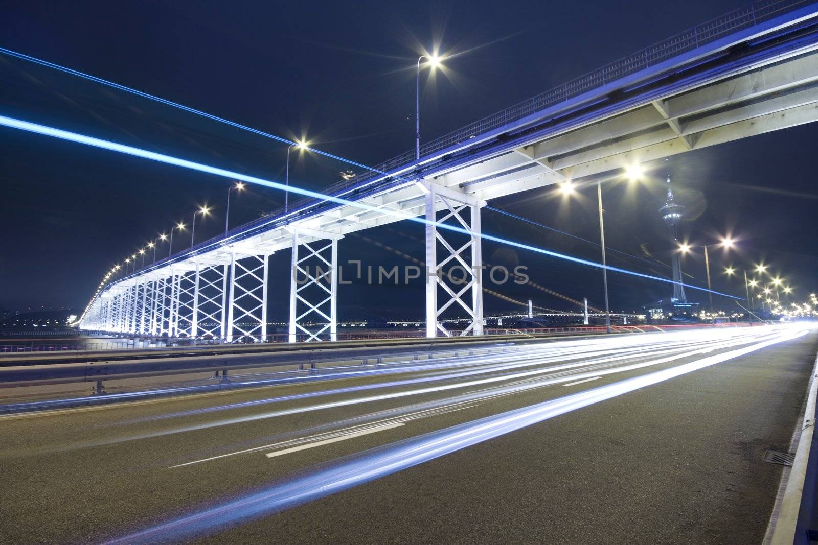 highway under the bridge in macau by cozyta