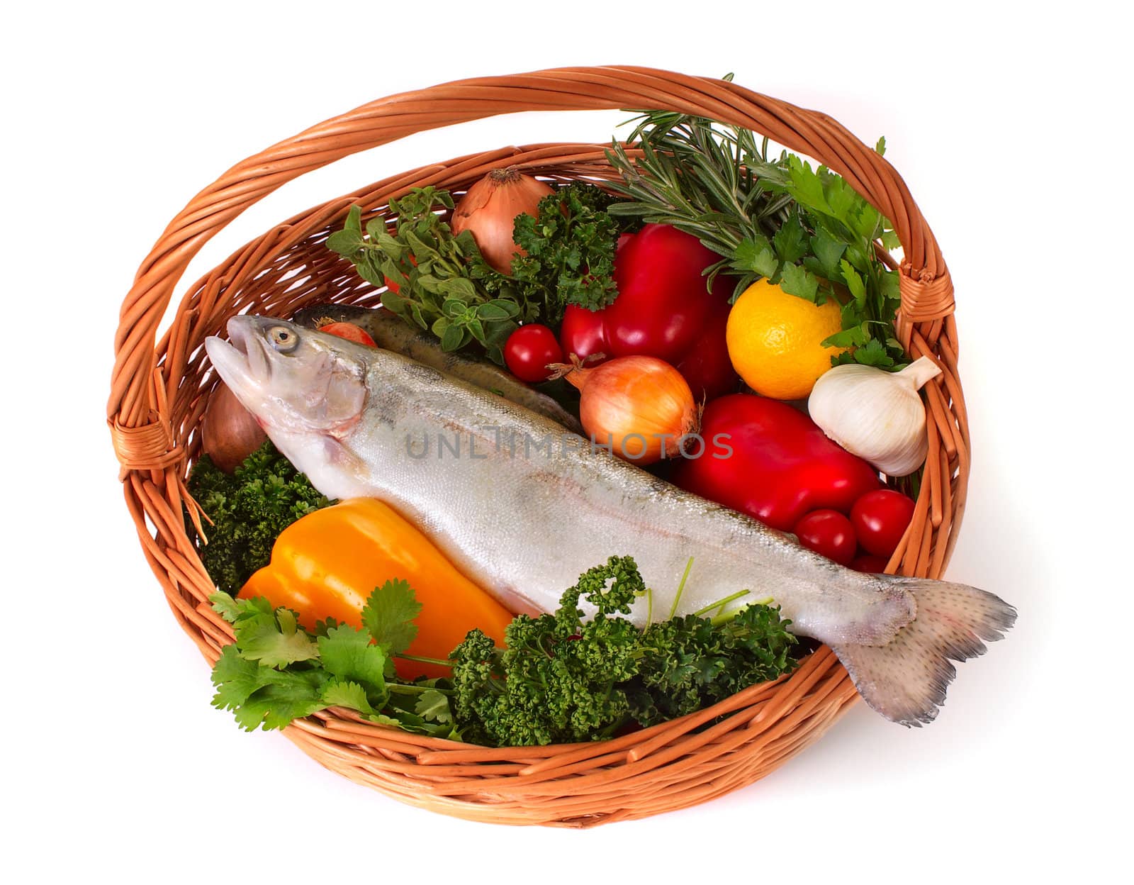 Still life. Basket with fresh vegetables and trout. 