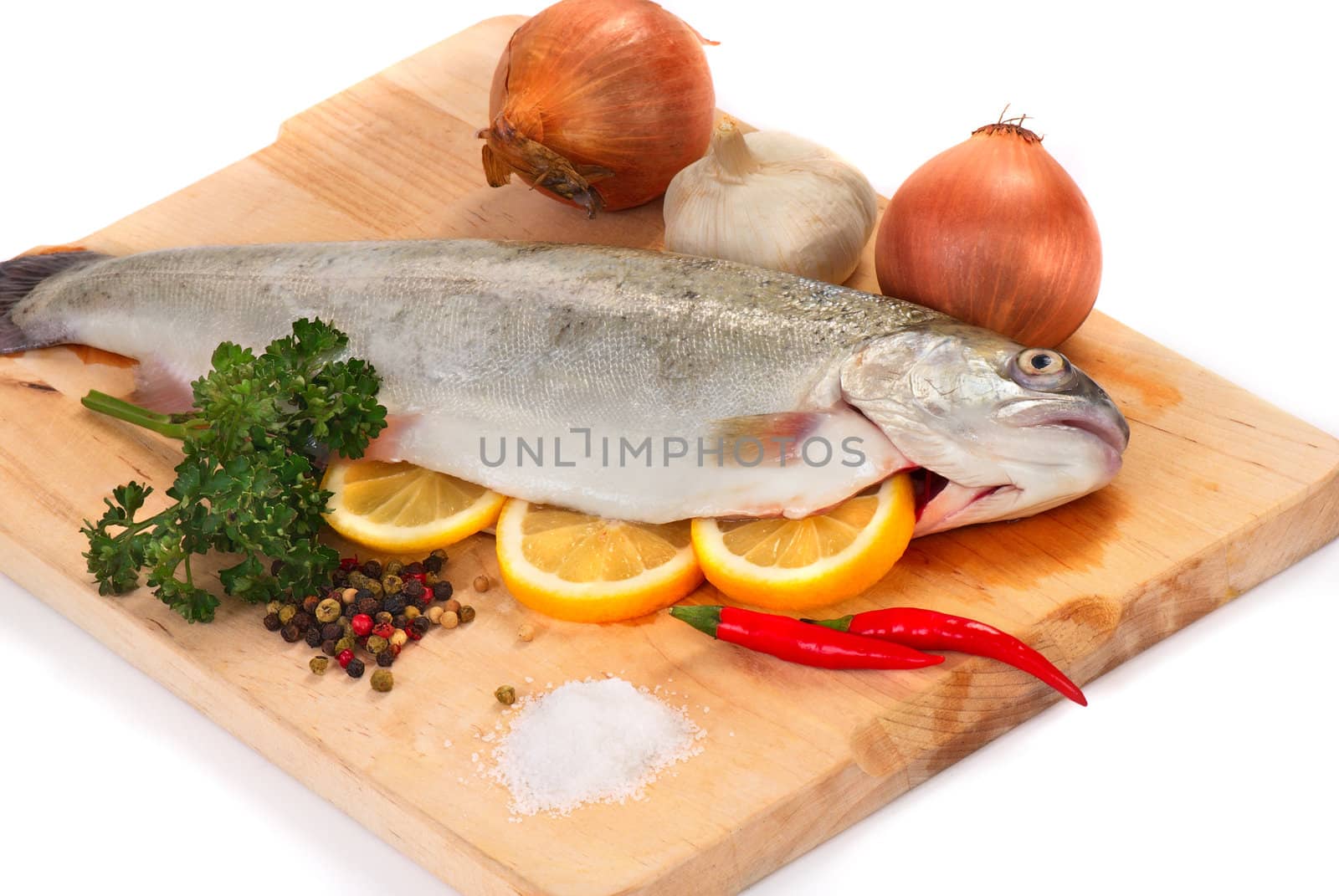 Trout on wooden board by Kamensky