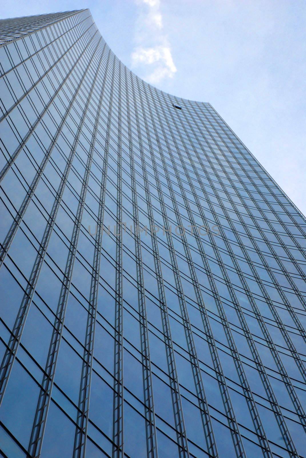 Mirrored skyscraper with an open window