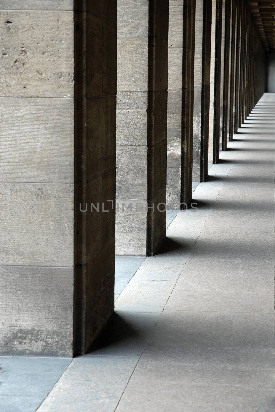 Architectural detail of several stone columns in a row