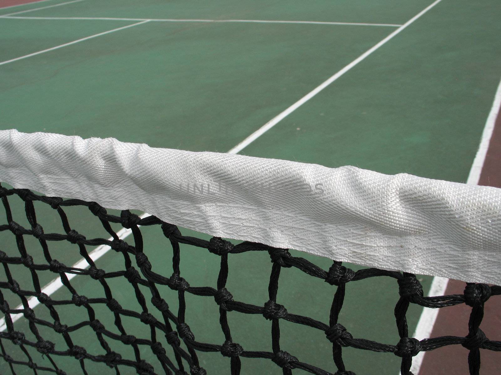 green tennis net close up by mmm