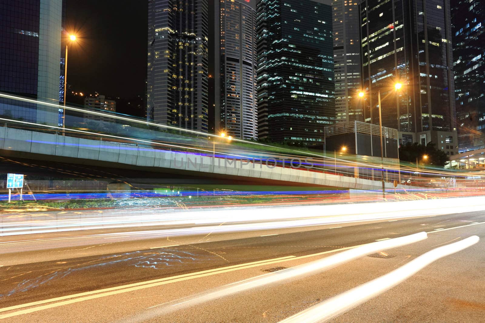 traffic in business district at night