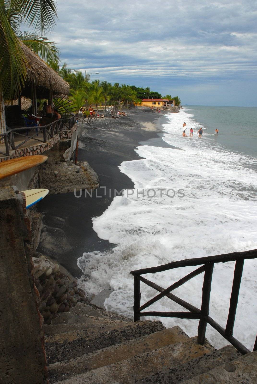 Stone staircase to a tropical beach surfer  by cienpies