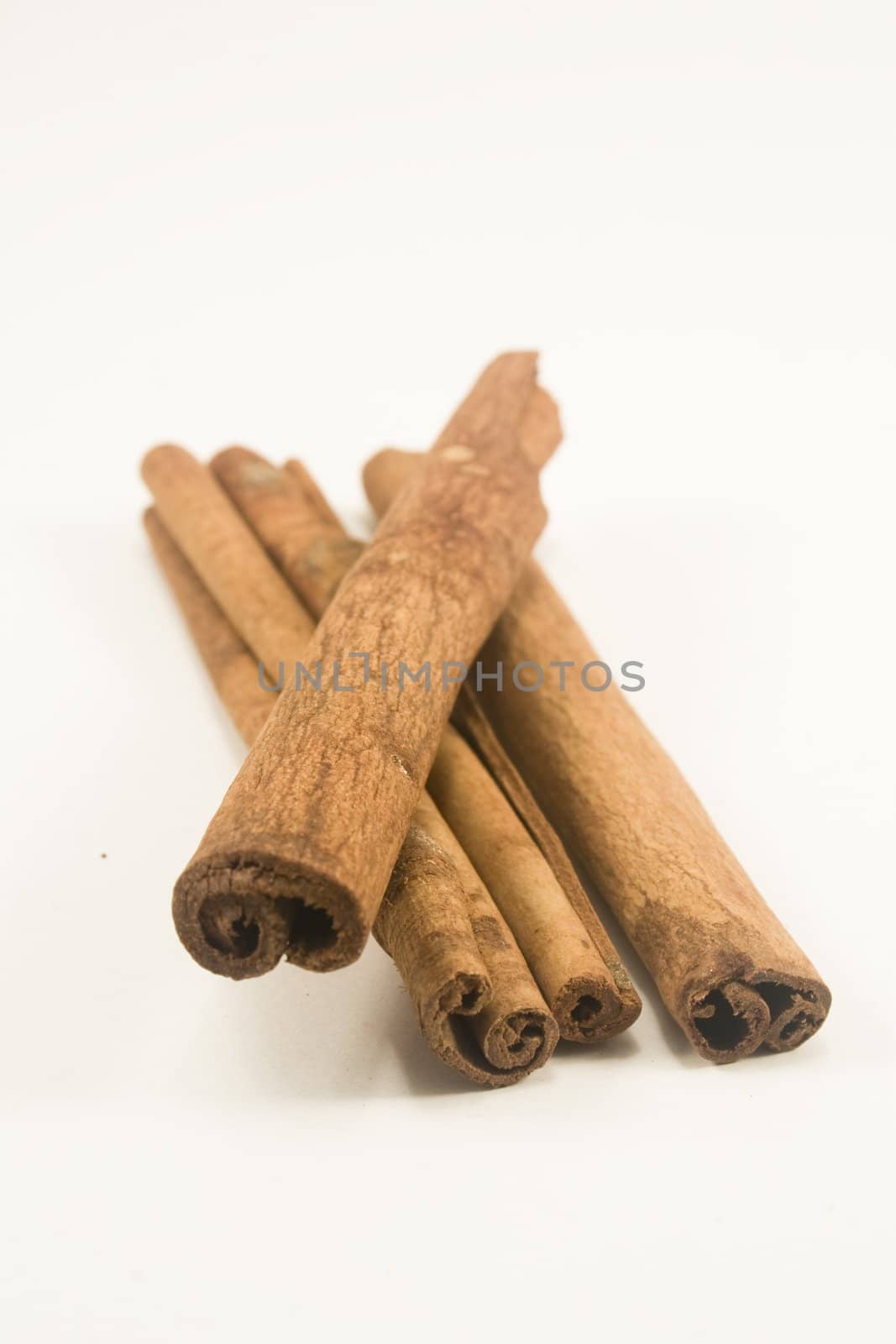 Cinnamon sticks isolated on white