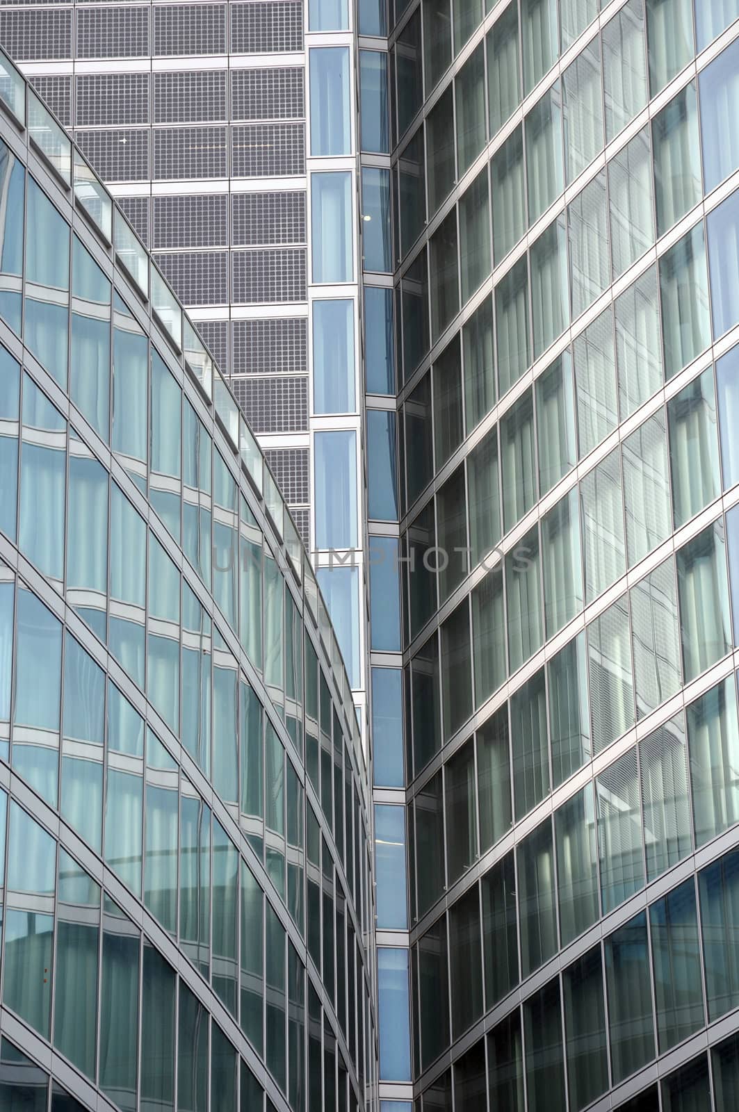 Modern building glass facades geometric lines and reflections