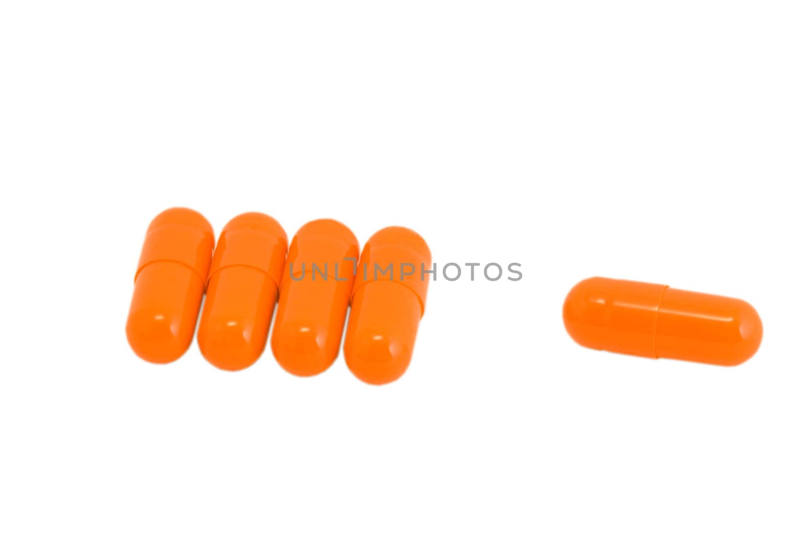 Vitamin pills on isolated white by rozhenyuk