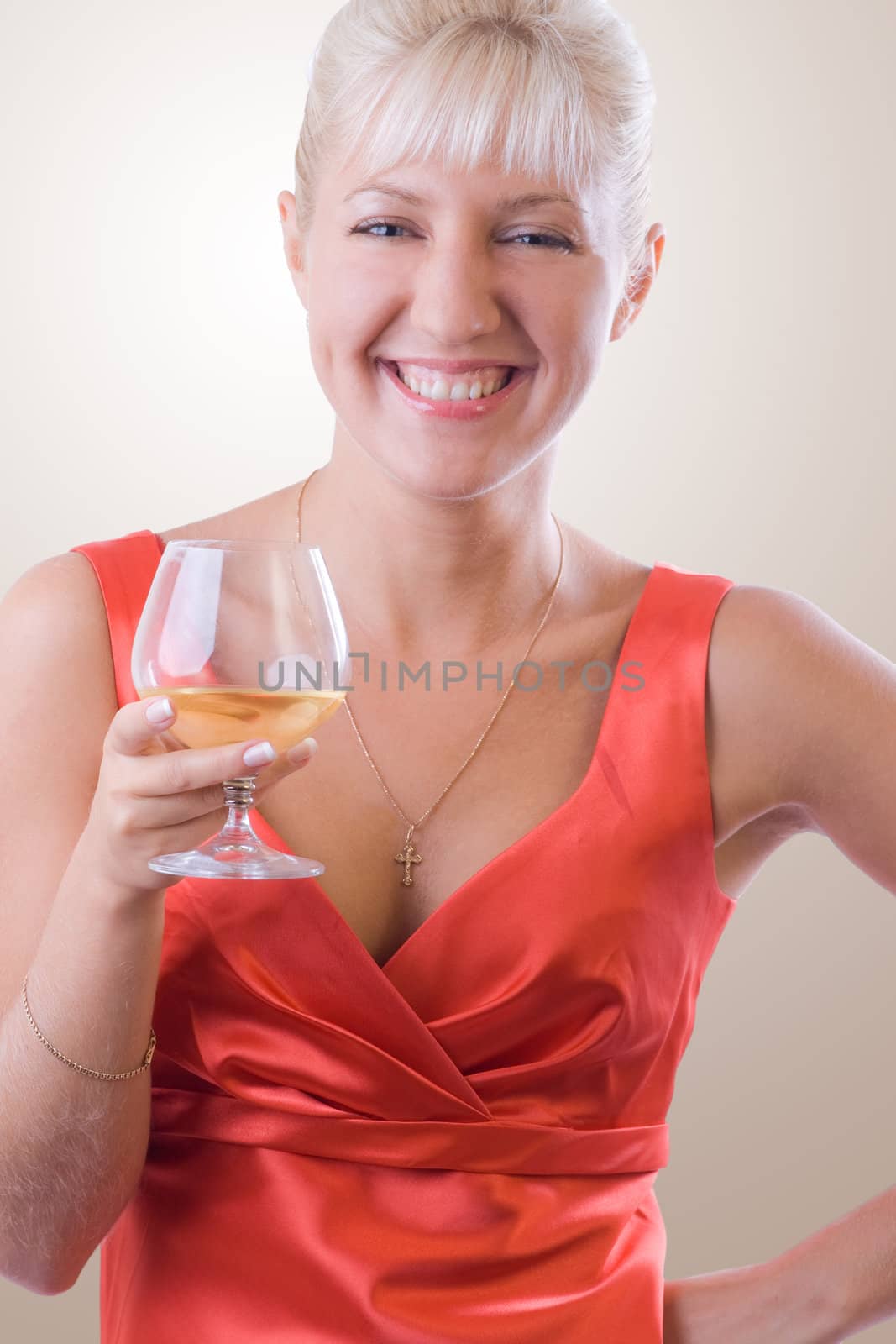 Blond woman with a glass of wine. #1 by Amidos