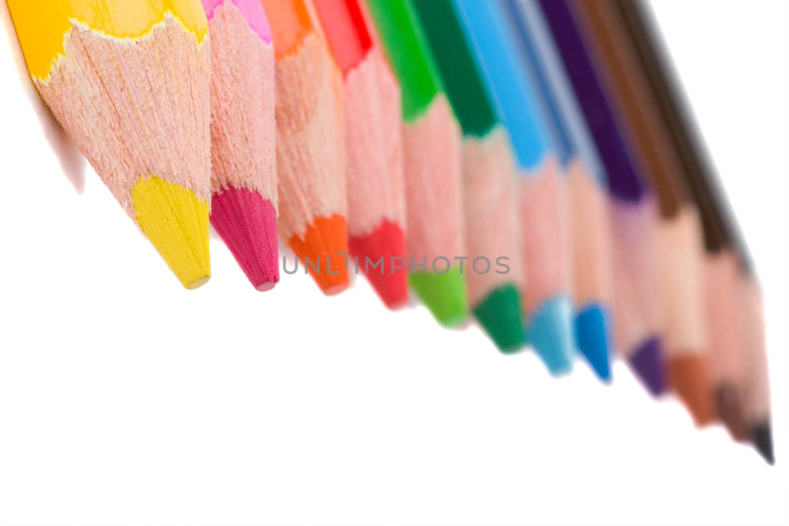 close-up group of color pencils, isolated on white