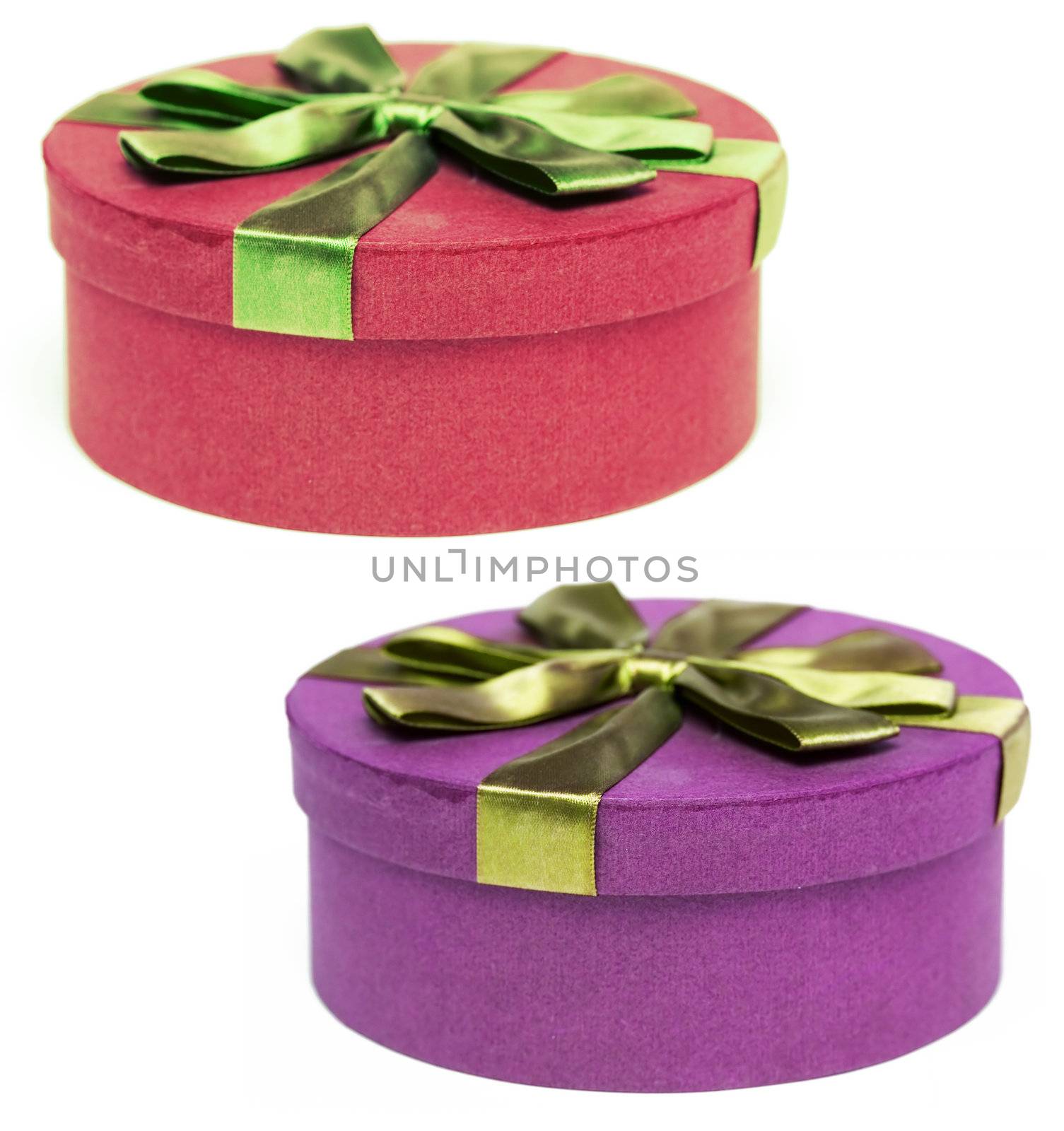 Two round colourful boxes on white