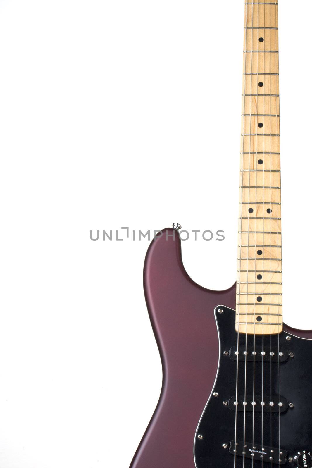 detail of a guitar neck on white background