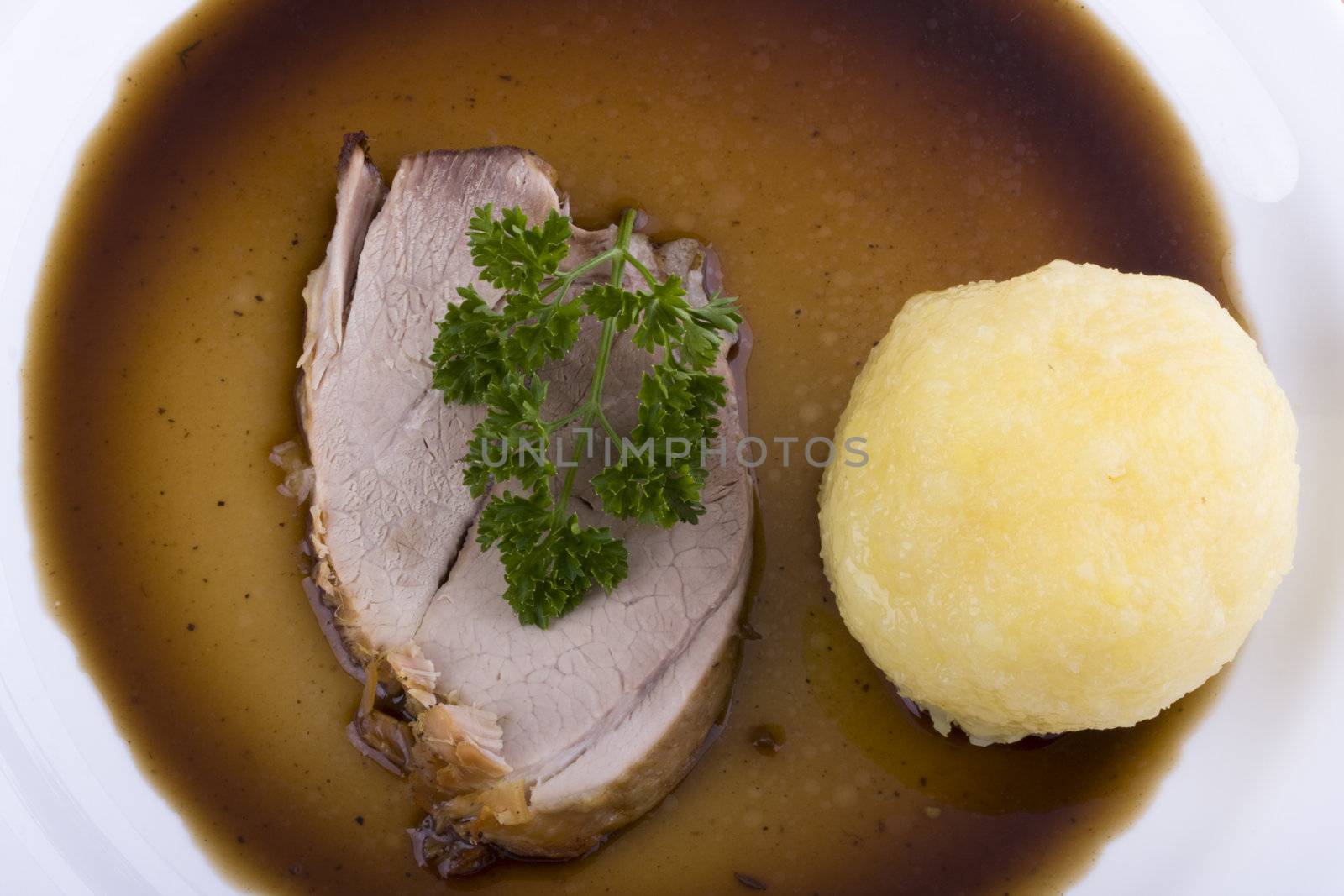 bavarian roast pork dish with potato dumpling by bernjuer