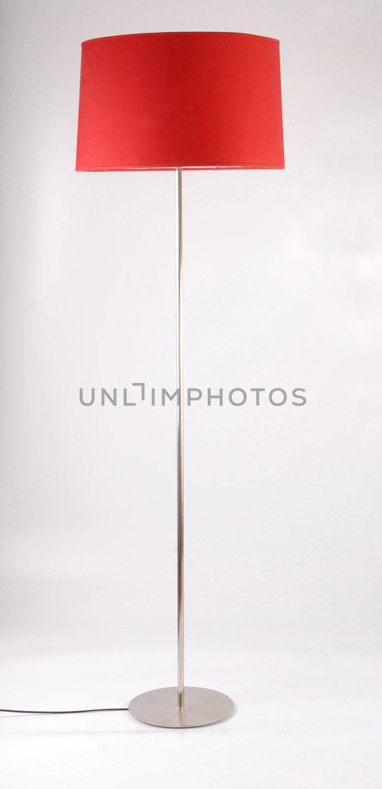 Red floor lamp isolated on white background by cienpies