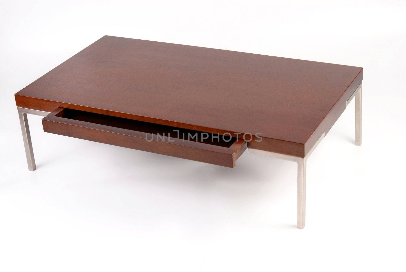 Wooden and metal coffee table with an open drawer. Isolated on white background