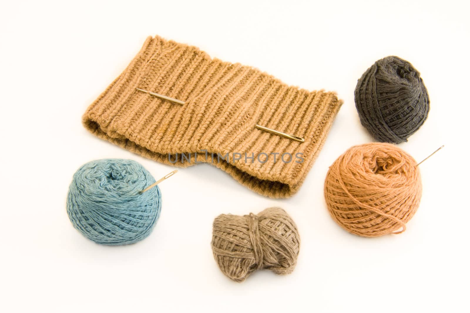 Knitted garment and skeins of yarn by rozhenyuk
