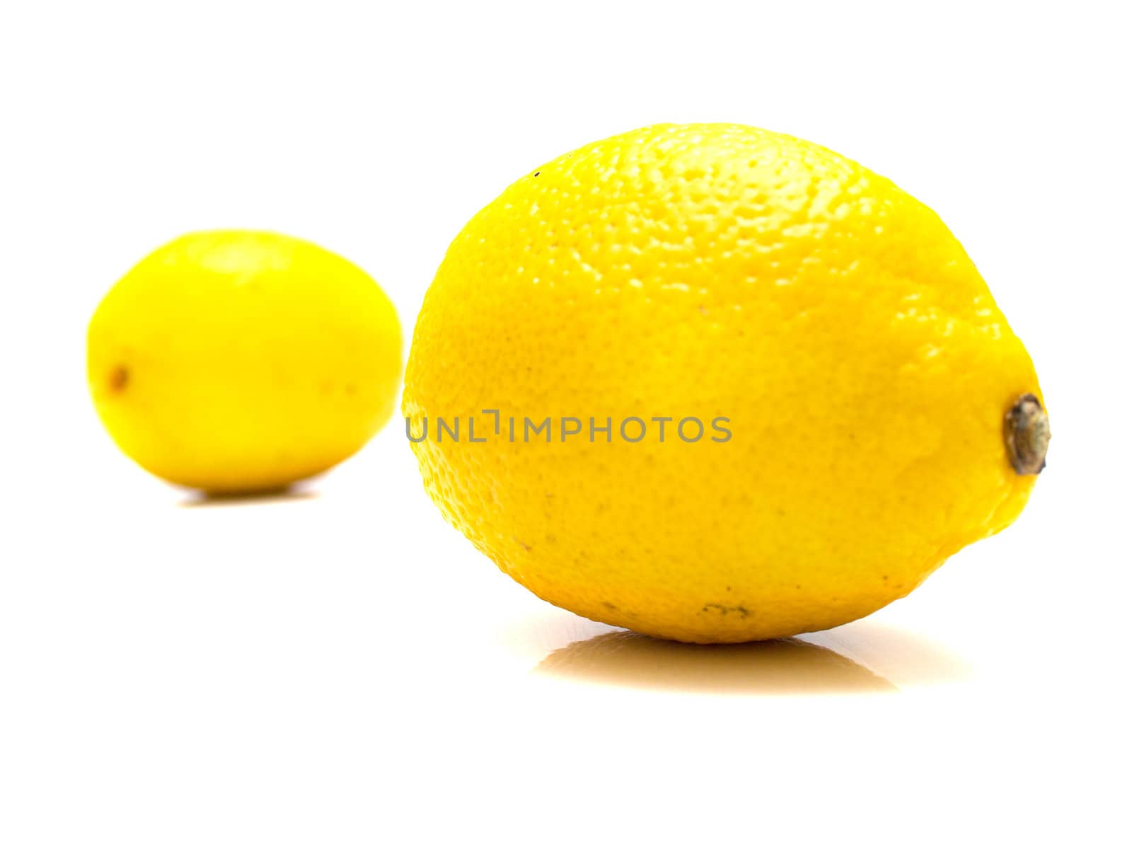 ripe juicy lemons on white. Isolation.